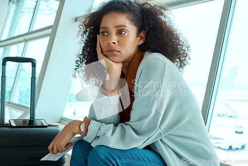 Image of Airport, flight delay and depressed woman sad for immigration fail, passport or schedule problem. Young USA person with luggage and ticket with stress, anxiety and thinking of airplane travel crisis