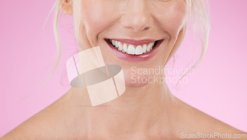 Image of Skincare, beauty and smile, teeth of woman isolated on pink background for promotion of cosmetic or dental product. Happy zoom on mouth of model in studio with mockup for luxury spa facial treatment.