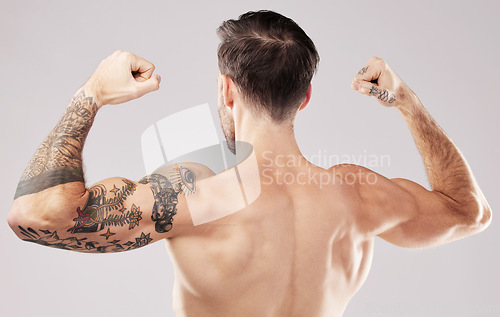 Image of Back, muscular and man with skincare, bodybuilder and fitness against grey studio background. Male, gentleman and athlete with muscles, dermatology and training for competition, workout and backdrop