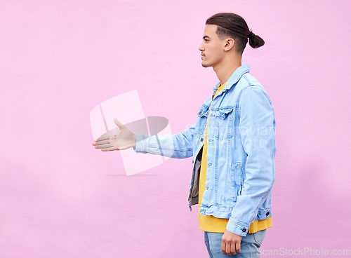 Image of Hand shake, meeting and deal with man and wall background with mockup for greeting, agreement or thank you. Partnership, hello and approve with profile of guy and pink background for positive gesture