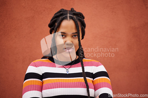 Image of Portrait, wall and black woman with frustration, anger and upset on brown studio background. Face, African American female and lady angry, stress and depression with frustrated facial expression