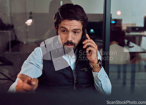 Image of Phone call, programmer and man talking in office, chatting and speaking to contact at night. Information technology, pointing and thinking male employee or coder with mobile smartphone for networking