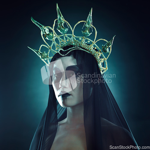 Image of Halloween, costume makeup portrait and grunge Korean cosmetics with grunge royalty aesthetic. Cosplay, goth fashion and Asian woman model with creative cosmetics and crown for dress up in studio