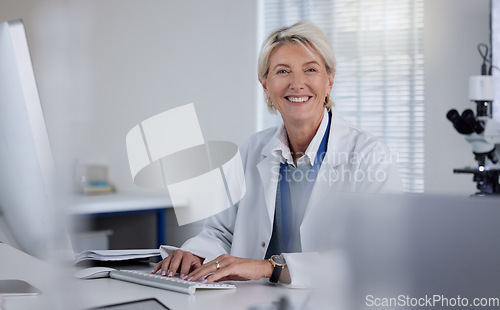 Image of Science portrait, computer and senior woman typing report of healthcare innovation, lab research or medical analysis. Clinic laboratory, medicine study and scientist happy for hospital development