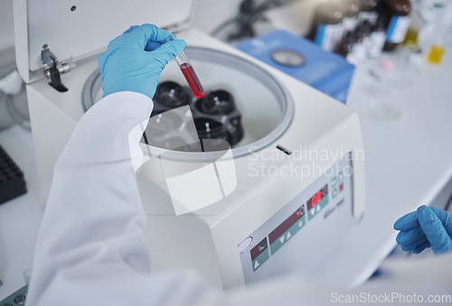 Image of Hands, test tube or laboratory centrifuge in science research, person dna engineering or data analytics. Zoom, scientist or blood vial in medical equipment, particles separation or vaccine innovation