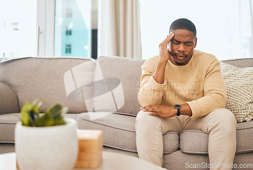 Image of Black man with headache, stress and burnout with mental health and anxiety, therapy and problem. Person in crisis, psychology and frustrated with migraine, pain and depressed, worried and fatigue