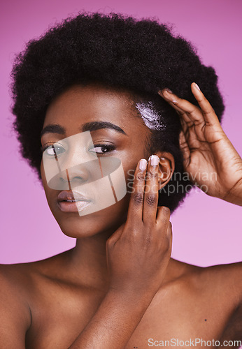 Image of Black woman, hair and cream conditioner for afro, haircare and ethnic texture on pink studio background. African model, hairstyle lotion product and scalp relaxer for maintenance, skincare and beauty