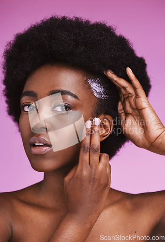 Image of Black woman, hair portrait and conditioner for afro, haircare and ethnic texture on pink studio background. African model, haircare cream and lotion product for scalp maintenance, skincare and beauty