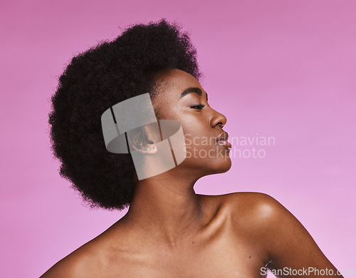 Image of Black woman, afro beauty and skincare on pink background for aesthetic facial, cosmetics and glow. Young african, studio model and curly hair for dermatology, wellness and laser salon transformation