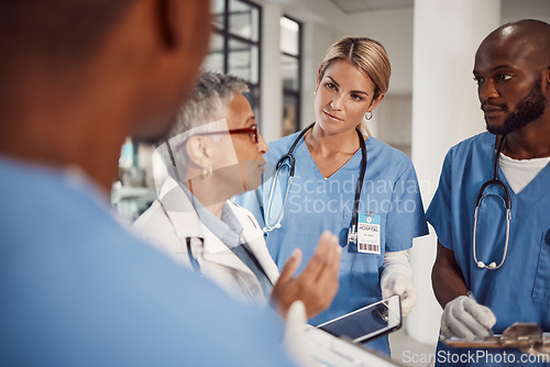 Image of Group of doctors, planning management in hospital and workflow of medical student with training manager on tablet. Nurses, professional healthcare people and technology for surgery problem solving