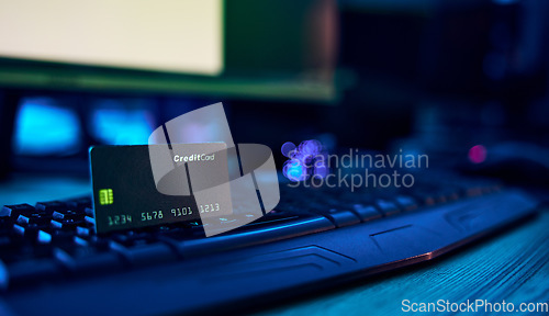 Image of Computer hacking, credit card fraud and financial theft via ransomware, fintech breach or software virus. Password phishing, neon cyber security or banking privacy risk from scam, ransomware or crime