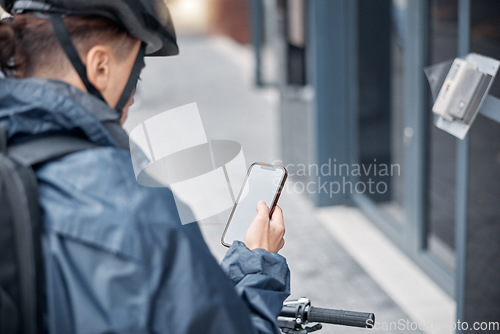 Image of Mockup, bike or man with phone for delivery in city, street or road for GPS, location or networking outdoor. App, travel or male search with smartphone or communication, social media or 5g network