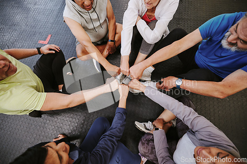 Image of Fist bump, fitness and people n gym training group, circle and community support teamwork for workout. Exercise club, goals and lose weight challenge of friends with collaboration emoji hands above