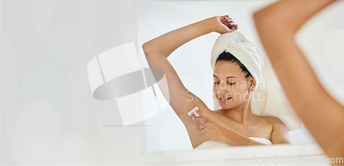 Image of Bathroom, epilation and woman shaving her armpit after a shower for hair removal or depilation. Hygiene, self care and healthy female with a shaver for her underarm at her home with mockup space.