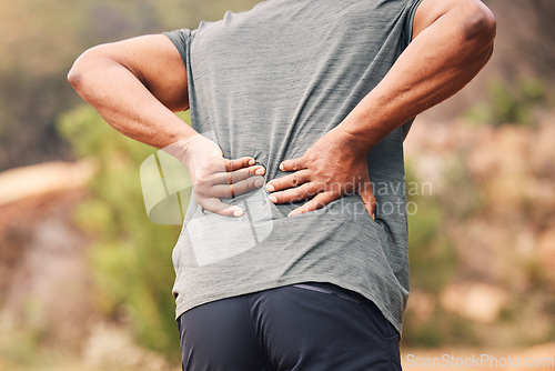 Image of Man with back pain, sport injury and outdoor hiking, spine and health, muscle tension and fitness in nature. Medical emergency, exercise accident and active lifestyle, inflammation with fibromyalgia