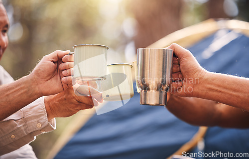 Image of Camping hands, mugs and people toast on outdoor nature vacation for wellness, freedom or natural forest peace. Drinks, group cheers and relax friends celebrate on holiday adventure in Australia woods