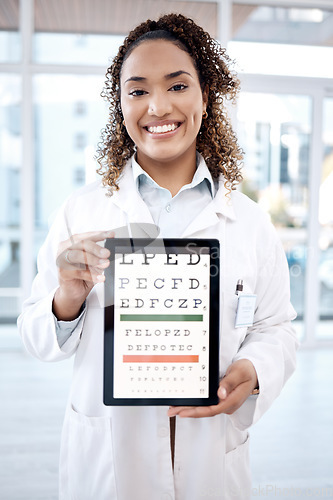 Image of Portrait, eye chart and woman with tablet in hospital for vision examination in clinic. Healthcare, snellen and ophthalmologist or medical doctor holding technology with text or letters for eyes test