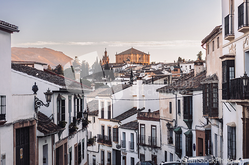 Image of Views of the medieval village of Ronda with white Andalusian houses and the gothic style church of Santuario de Maria Auxiliadora. Malaga, Spain.