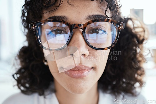Image of Portrait, therapist and face of woman with glasses, spectacles or eyewear feeling calm and focused. Head, vision and closeup of employee or worker looking serious with eyesight in an office