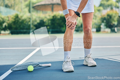 Image of Tennis court, woman knee injury and training outdoor for fitness, health or wellness by blurred background. Summer, sports and exercise with pain in legs at game, contest or competition in sunshine