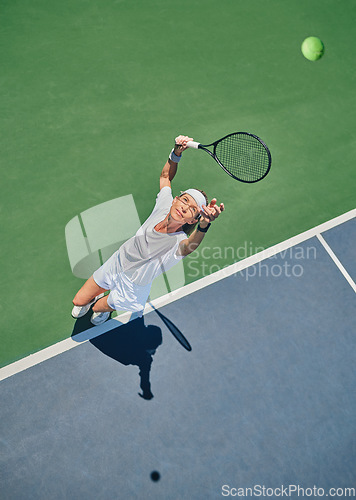 Image of Tennis serve, sport and woman on outdoor court, fitness motivation and competition with athlete training for game. Workout, healthy and player on turf, active with exercise and sports action top view
