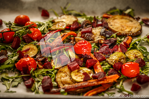 Image of Roasted vegetables with fresh rocket