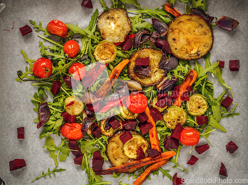 Image of Grilled vegetables on rocket bed