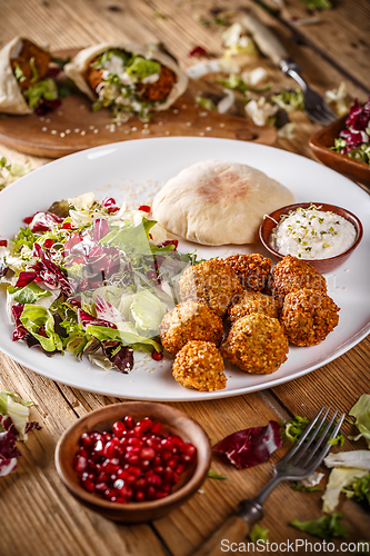 Image of Falafel balls with salad