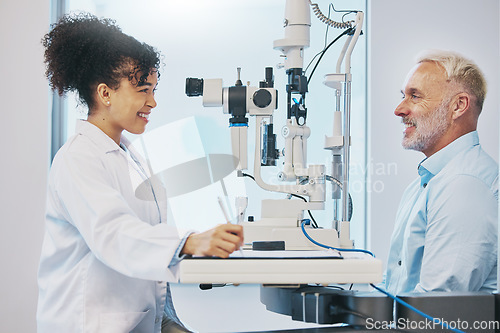 Image of Vision, eye test and healthcare with a doctor woman or optometrist testing the eyes of a man patient in a clinic. Hospital, medical or consulting with a female eyesight specialist and senior male