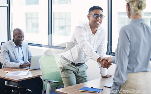 Image of Partnership, handshake and greeting business people in office in an agreement, collaboration and as colleagues. Team, corporate and meeting employee and worker at the workplace together