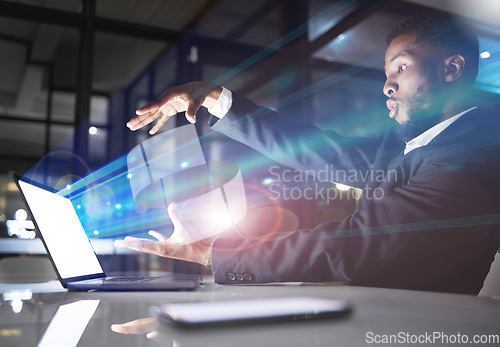 Image of Hologram, futuristic light and black man with laptop in office workplace at night. Technology, future mockup and male employee with computer for 3d business, digital transformation or holographic.