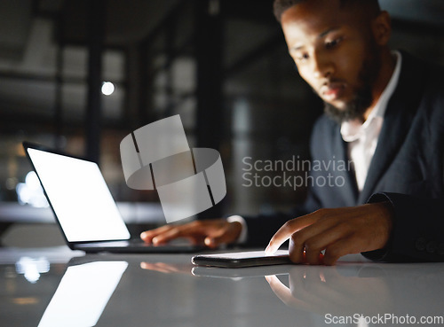 Image of Laptop screen, phone and black man at night for fintech management, trading and stock market data analysis. Finance, accounting and business person with omnichannel for global investment and mockup