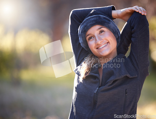 Image of Hiking, stretching and mock up with a woman in nature, thinking about a hike in the woods or forest. Fitness, warm up and a female hiker getting ready for a walk outside in the natural wilderness