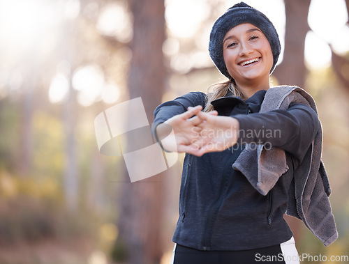 Image of Hiking, portrait and mockup with a woman stretching in nature, outdoor for a hike in the woods or forest. Fitness, warm up and a female hiker getting ready for a walk outside in the wilderness