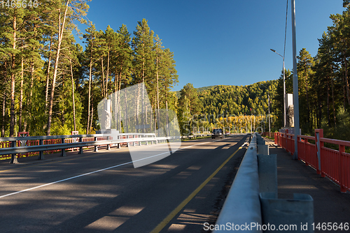 Image of Bridge over a mountain river Katun