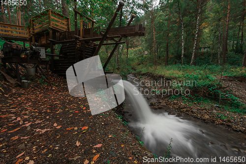 Image of Rustic watermill with wheel