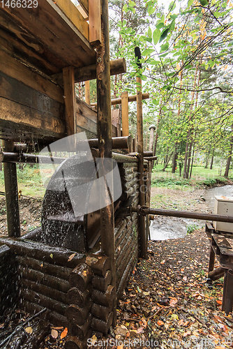 Image of Rustic watermill with wheel