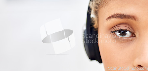 Image of Call center, eye or face of serious woman with mockup for customer support, consulting or networking in studio. Portrait, CRM or sales advisor on tech for telemarketing, focus or telecom contact us