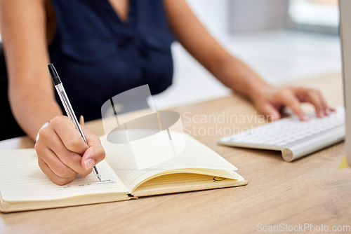 Image of Hands, accountant or woman writing in notebook for financial strategy or company growth tax audit review in office. Finance, keyboard or advisor for stock market, invest budget or mortgage planning