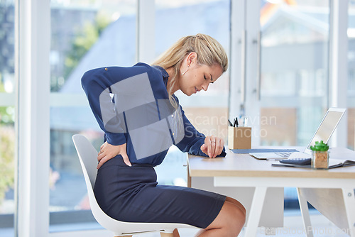 Image of Back pain, office chair and woman with medical, healthcare and muscle problem working at an uncomfortable desk. Burnout, tired and stress of business worker or professional person with spine risk