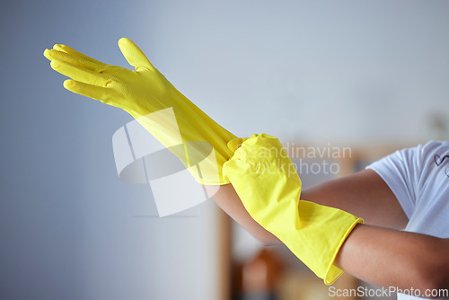 Image of Hands, latex gloves and preparation for housekeeping, cleaning or disinfection safety from bacteria at home. Hand of cleaner in healthy hygiene, protection or service for sanitize or germ removal