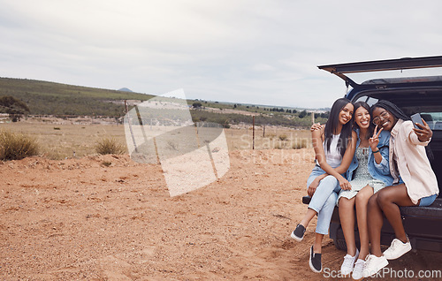 Image of Peace sign, road trip and women friends take a selfie, having fun or enjoying time outdoors. Car travel, v gesture and group of happy girls in nature or safari taking pictures for social media memory
