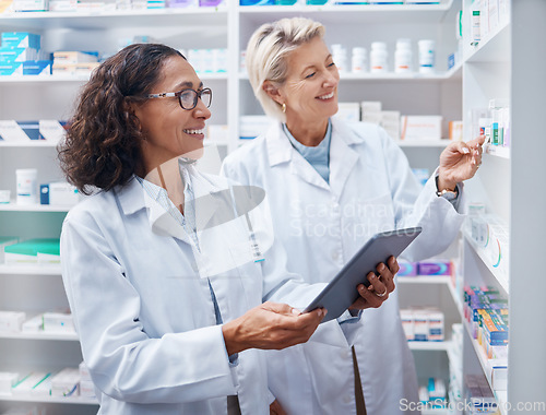 Image of Tablet, teamwork and pharmacist check stock in pharmacy, drugstore or medication shop. Medicine, technology and medical doctors or happy senior women with touchscreen for checking product inventory.