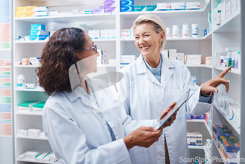 Image of Doctors, tablet and pharmacist check stock in pharmacy, drugstore or medication shop. Medicine, technology and medical teamwork of happy senior women with touchscreen for checking product inventory.