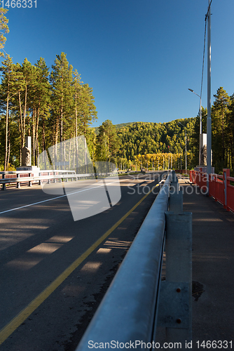 Image of Bridge over a mountain river Katun