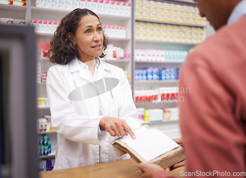Image of Pharmacy, medicine and senior woman pharmacist talking to man about pills side effects. Reading, prescription info and healthcare worker working with customer service for health and wellness check