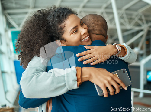 Image of Black people hug, reunion at airport and travel with love, care and relationship, happy to see partner after trip with couple. Hello, happiness and commitment, together and embrace with greeting