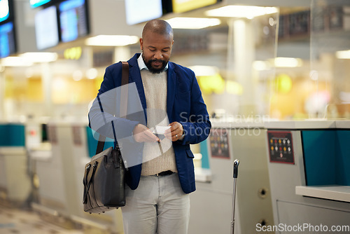 Image of Black man, airport and passport with plane ticket ready for travel, departure or flight time by help desk. African American male waiting at airline terminal with documents for traveling services