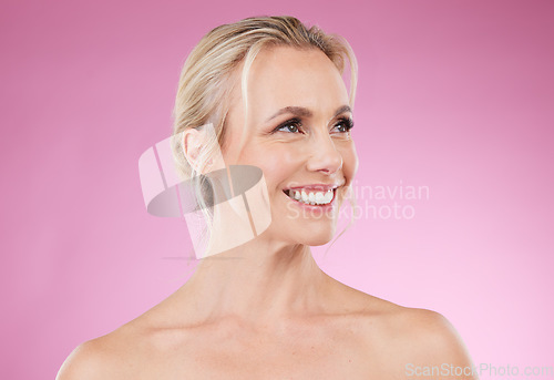 Image of Beauty, dental and profile of woman with smile, glowing skin and natural makeup in studio. Mockup, advertising and luxury skincare cosmetics, face of happy mature model isolated on pink background.