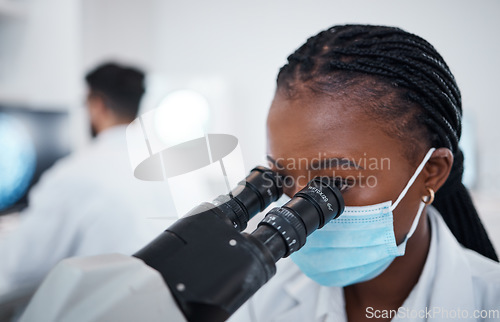 Image of Microscope, covid scientist and black woman in laboratory for experiment, research or analysis. Science, innovation and female doctor or medical expert with equipment for testing bacteria and corona.